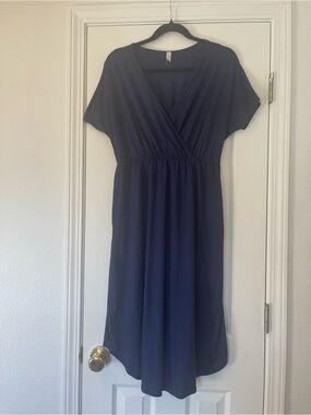 Classic Navy Wrap-Front Women’s Dress with Pockets.